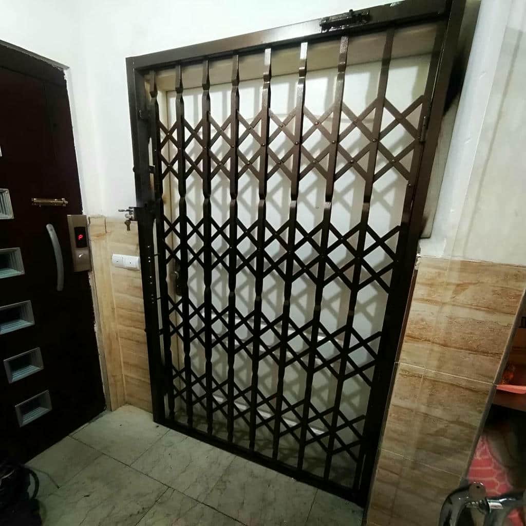 نصب درب آکاردئونی آپارتمان چهارگل در کرمان