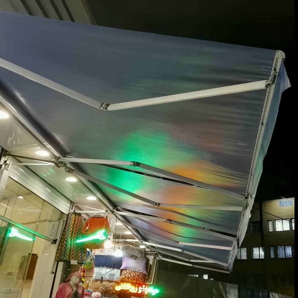 خرید سایبان برقی ضد آب بازویی در بومهن