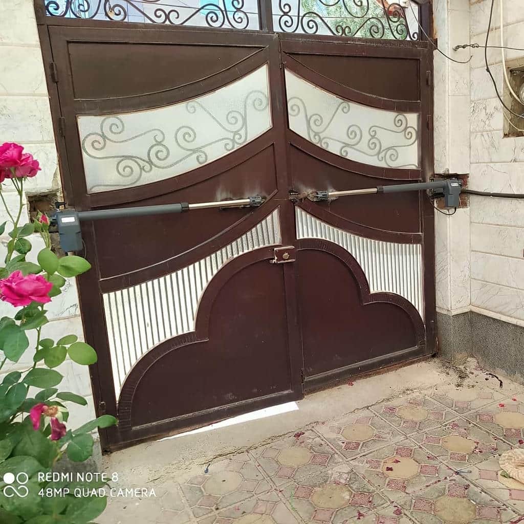 نصب جک درب پارکینگ اتوماتیک چشمی دار در قشم