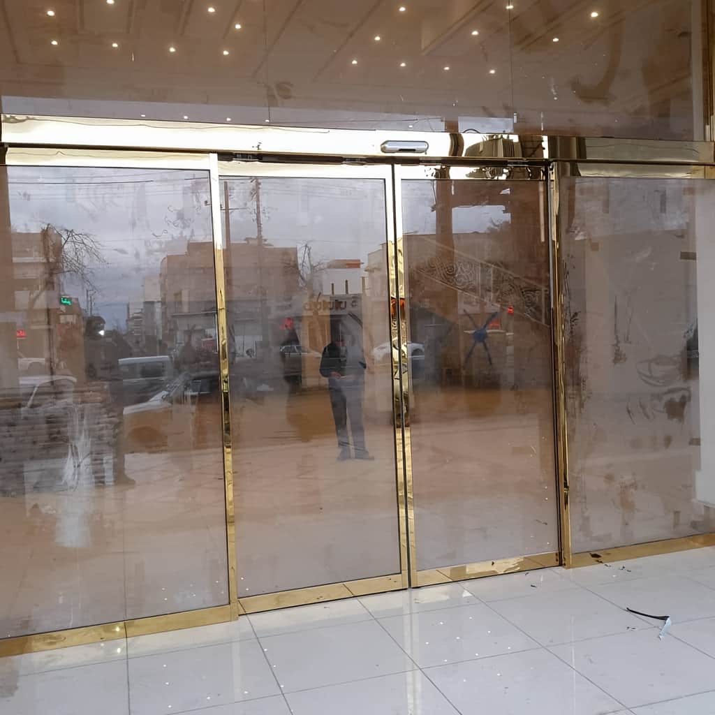 فروش درب اتوماتیک شیشه‌ای اداری تلسکوپی