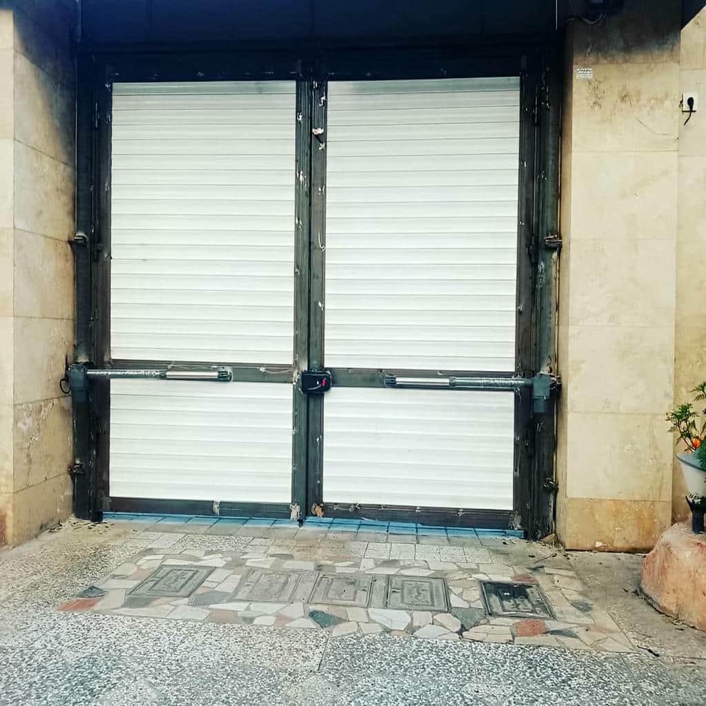 جک بازویی درب پارکینگ دو لنگه مدل برق شهری